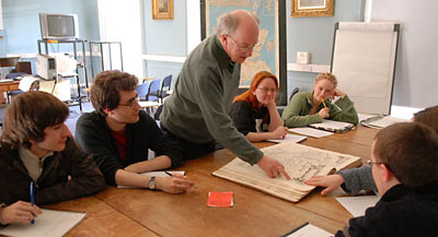 Ian Fraser with the Blaeu Atlas in a Scottish Ethnology 2 class