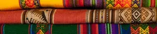 Brightly coloured material in a stack 
