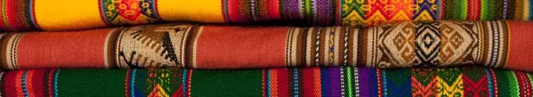 Brightly coloured material in a stack 
