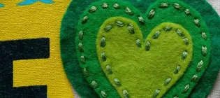 embroidered heart symbol