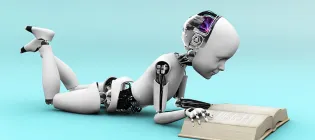 Photo of a robot reading a book