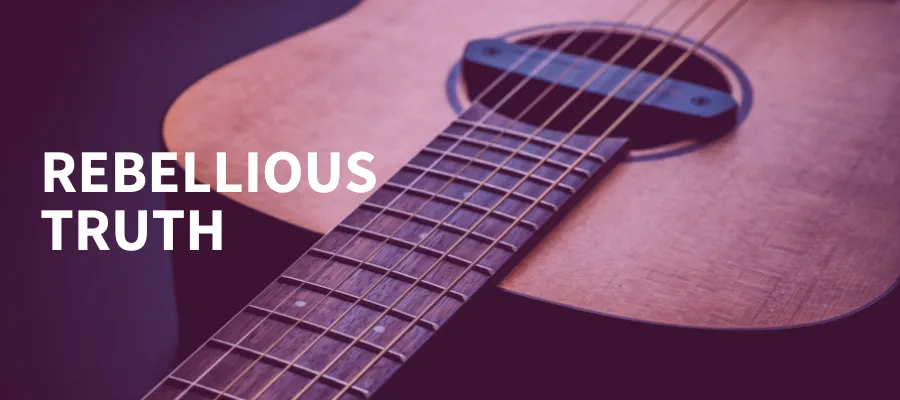 a close up image of a guitar lying on its back with event title overlaid