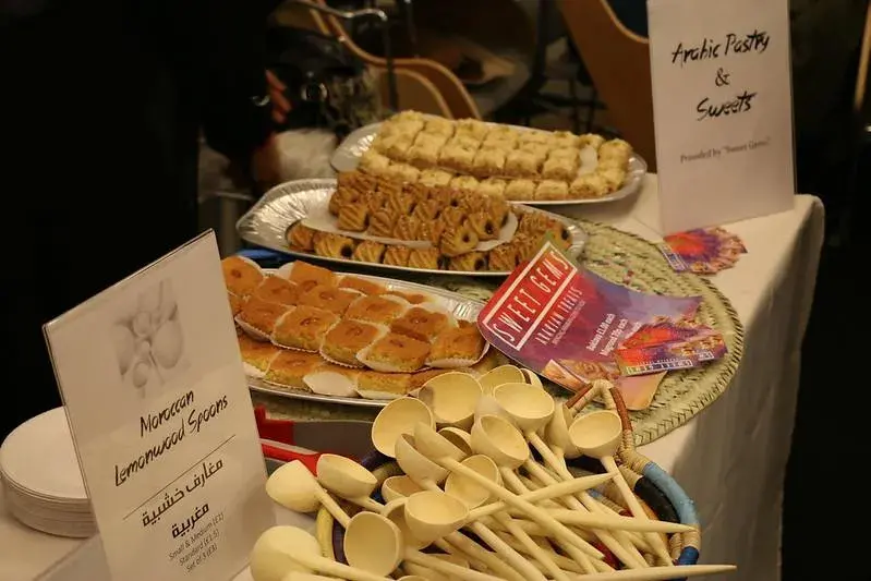 Middle Eastern food at a table for a Meet, Greet and Eat event