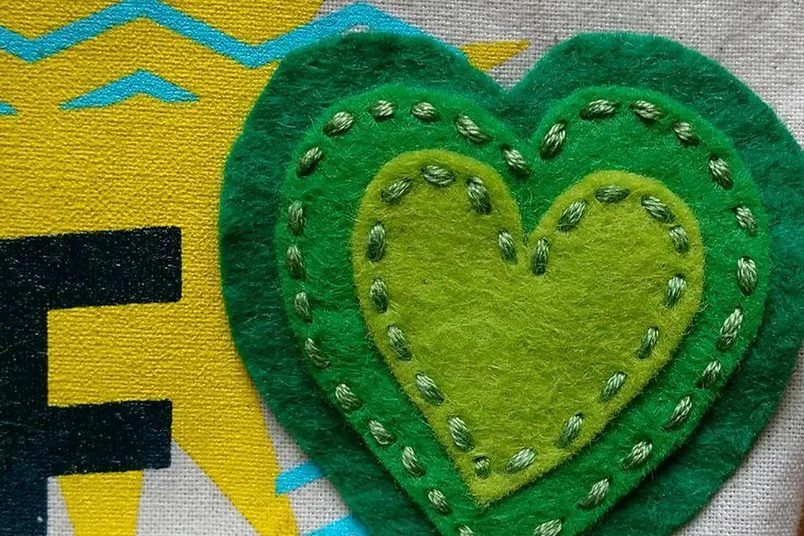 embroidered heart symbol