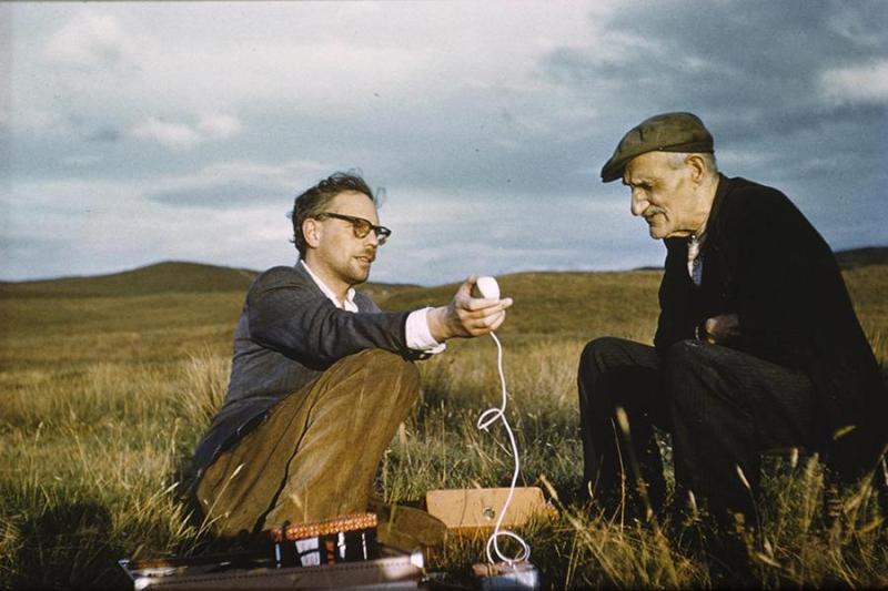 Photo of two men with a microphone