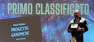 Photo of Marco receiving an award