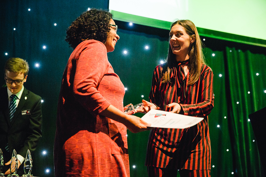 Eleoma receiving her teaching award