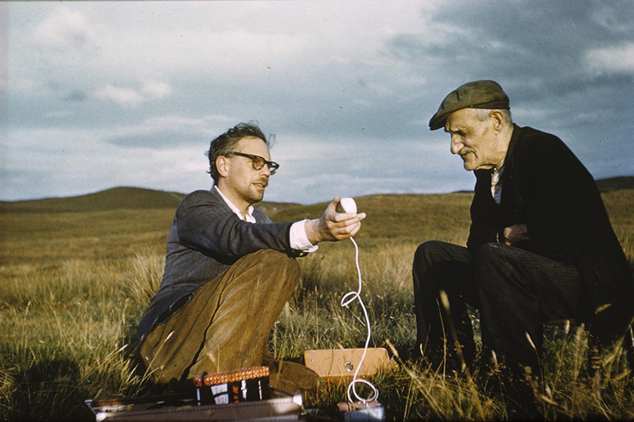 Hamish Henderson doing fieldwork