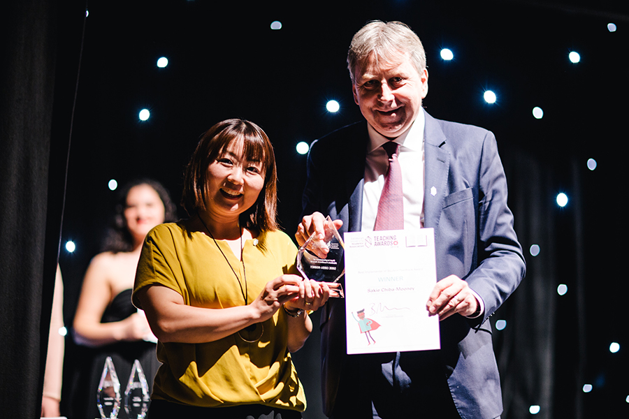 Photo of Sakie with her award